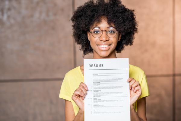 Woman holding her resume