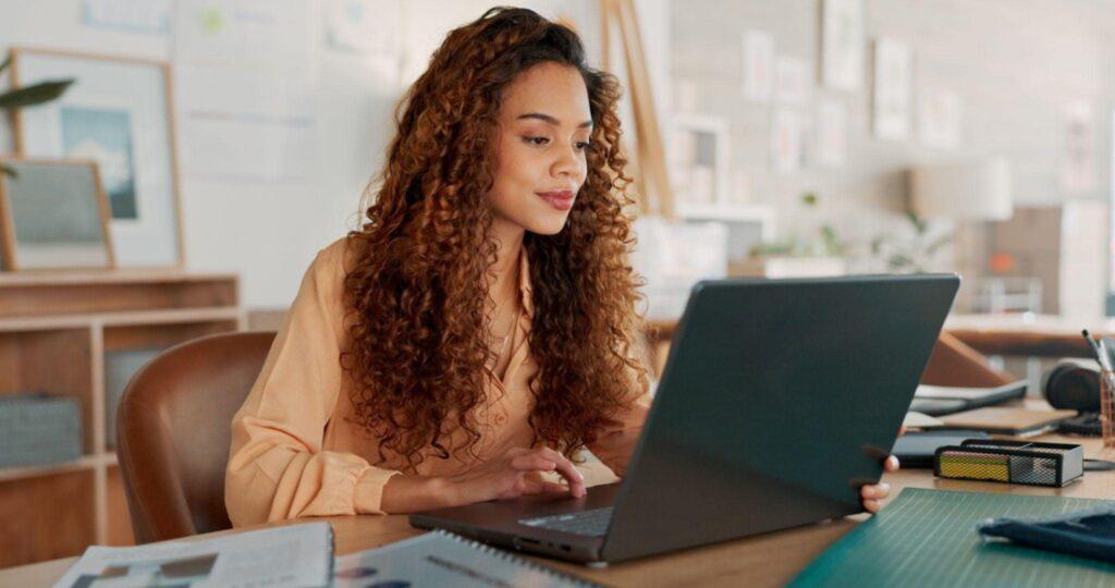 young lady working on laptop