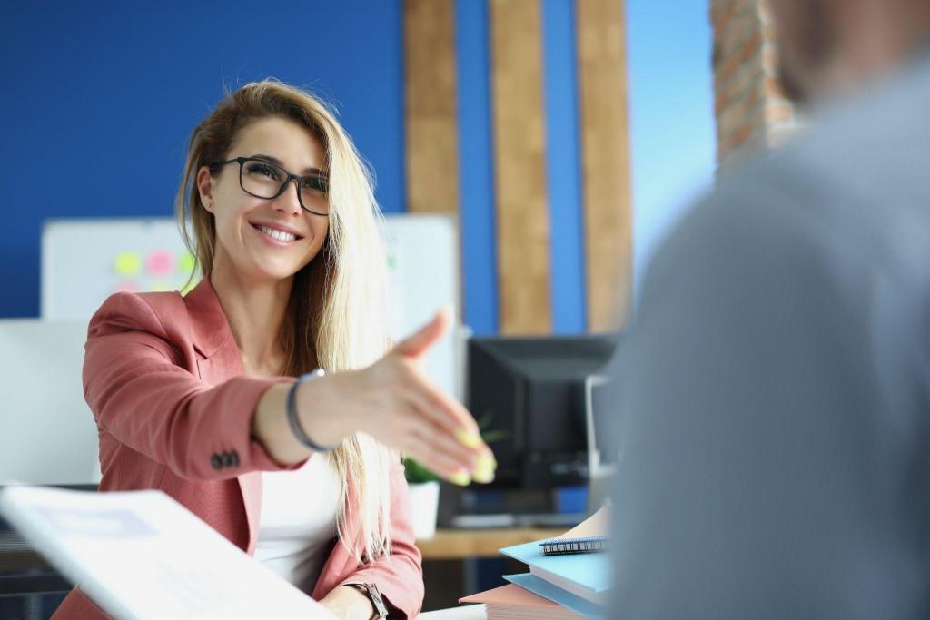 woman shaking hands with interviewee