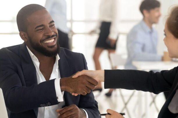 interviewer and interviewee shaking hands