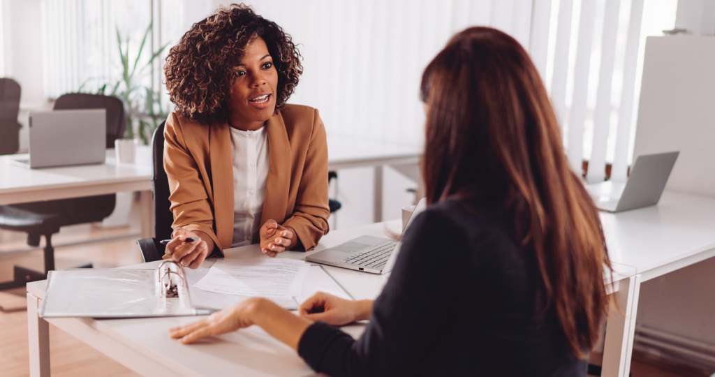 two females in an IT interview for staffing purposes