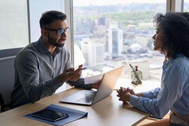 woman in a tech interview with a male interviewer