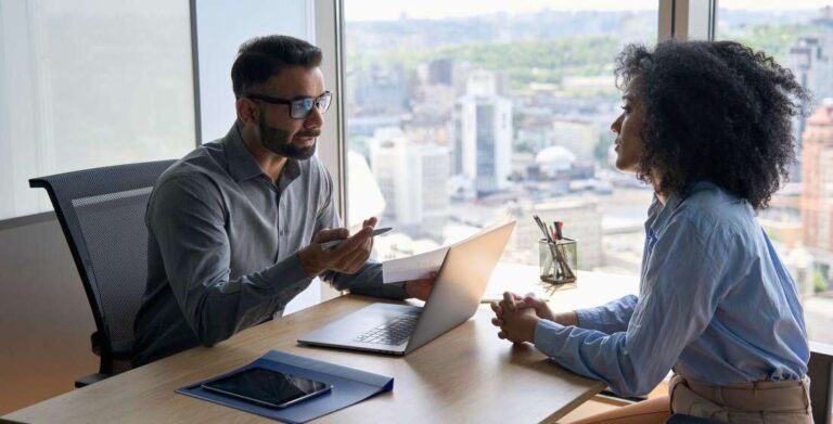 woman in a tech interview with a male interviewer