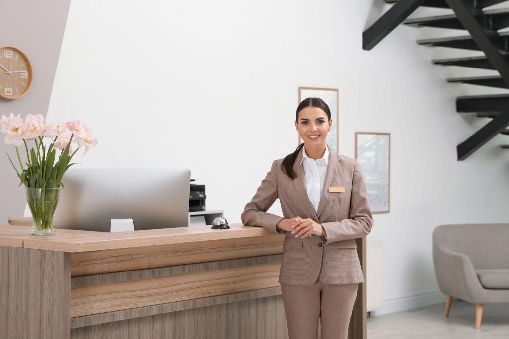 young receptionist at a hotel lobby