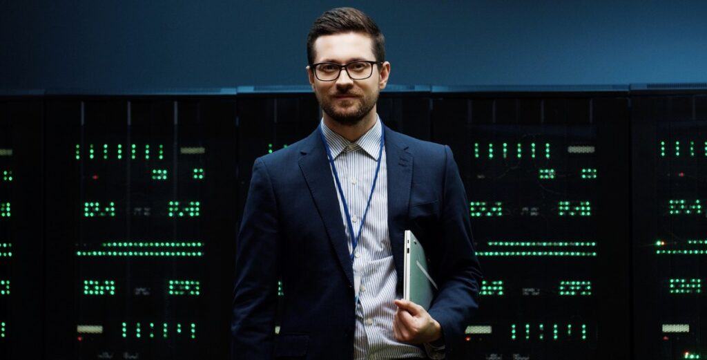 IT professional in data center, representing AI hiring demand