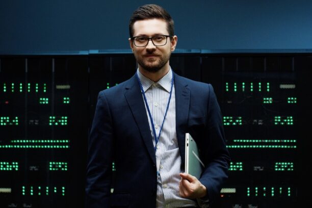 IT professional in data center, representing AI hiring demand